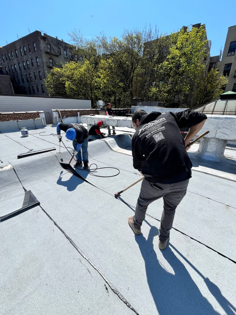 Rosebank Roofing team carrying out roof maintenance on a residential property
