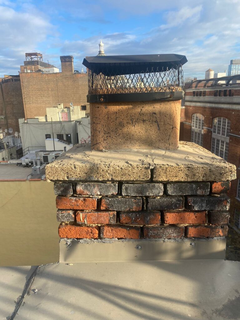 Chimney service and roof repair being provided by Laurelton Roofing experts