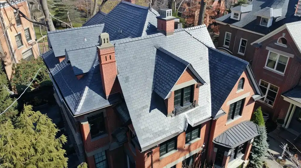 Home with slate roof installed by local roofing contractors in Brooklyn